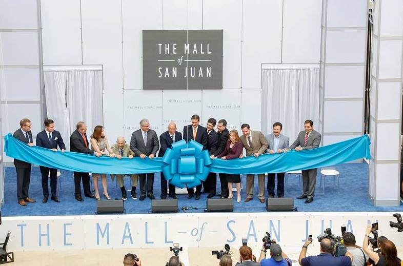 Blue ribbon across stage at the Mall of San Juan