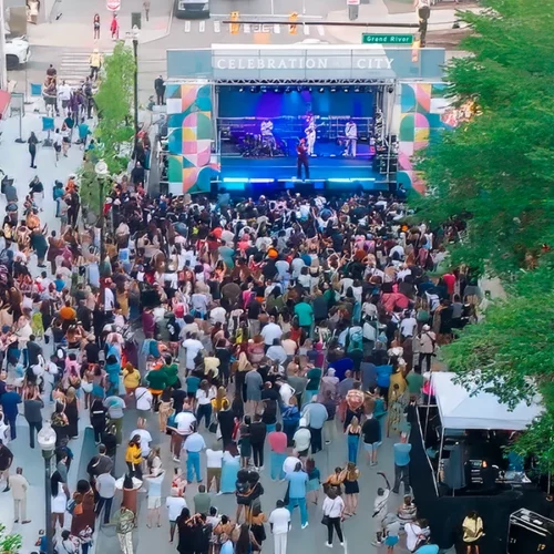 Aerial view of outdoor concert crowd at Book Tower grand opening