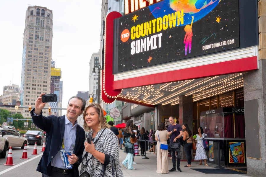 TedX_Countdown_Detroit_05 Man and woman take a selfie in front of marquee
