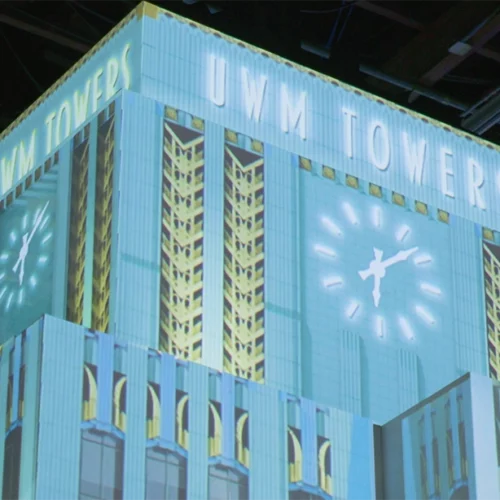 Close-up of UWM Towers art deco building prop with projection mapping