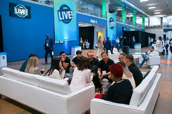 attendees meet in event lobby