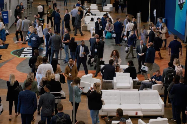 Attendees mingle in main lobby